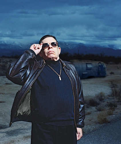 In the only known photo of the two together, noted talk radio host Art Bell poses with the notorious airstream trailer housing mjp visible in the background.